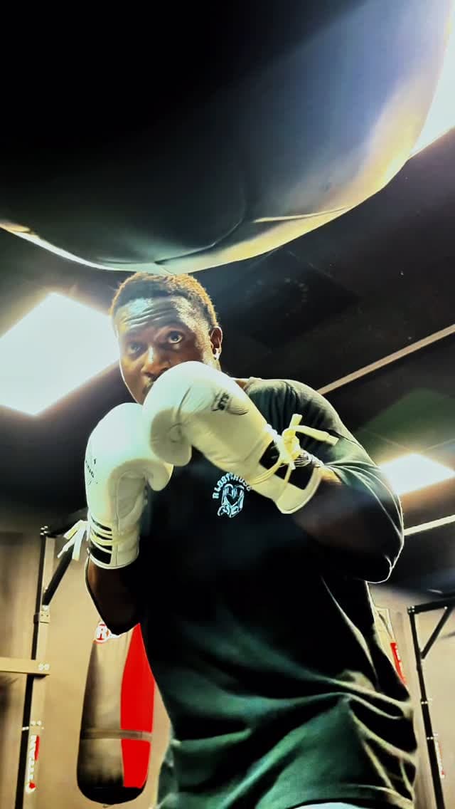 Kenneth Sene with his guard up in white gloves